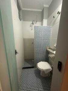 Ένα μπάνιο στο Unity Hotel - Santos