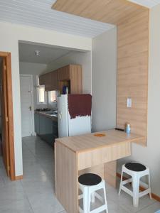 Køkken eller tekøkken på Apartamento Mobiliado