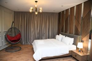 Postel nebo postele na pokoji v ubytování Suite Bahiya 15