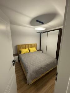 Ένα ή περισσότερα κρεβάτια σε δωμάτιο στο Tiny House Craiova