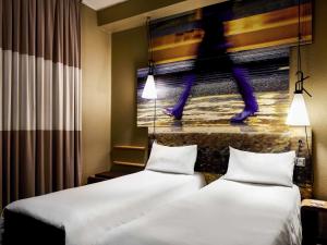 Postel nebo postele na pokoji v ubytování Ibis Milano Centro + 172 fotografií