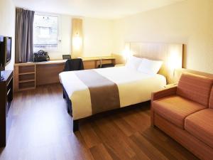 Postel nebo postele na pokoji v ubytování ibis Strasbourg Centre Petite France