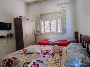 Postel nebo postele na pokoji v ubytování Hospedagem Becker + 4 fotografie