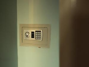 a electrical outlet on a wall in a room at Residence Stella in Pomigliano dʼArco +14 photos