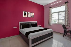 Ένα ή περισσότερα κρεβάτια σε δωμάτιο στο Hotel O Rudraksh Palace