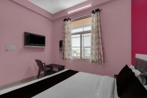 Μια τηλεόραση ή/και κέντρο ψυχαγωγίας στο Hotel O Rudraksh Palace