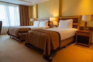 Postel nebo postele na pokoji v ubytování Annebrook House Hotel + 18 fotografií