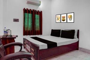 Postel nebo postele na pokoji v ubytování SPOT ON Happyness Restaurant