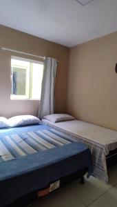 Postel nebo postele na pokoji v ubytování Chalés Aconchego da Serra para Casal