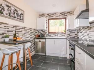 Köök või kööginurk majutusasutuses Camellia Cottage