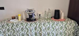 a table with a black and white table cloth with a table sidx sidx at San Vincenzo B in Genoa