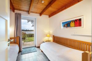 Postel nebo postele na pokoji v ubytování Weidenuferhaus