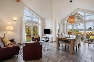 TV a/nebo společenská místnost v ubytování Weidenuferhaus