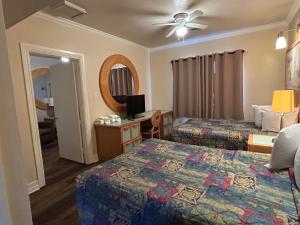 Postel nebo postele na pokoji v ubytování Sea Vista Motel