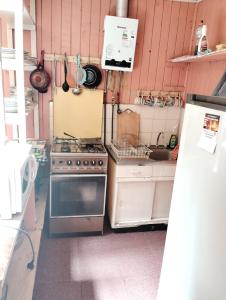 Η κουζίνα ή μικρή κουζίνα στο Cabañas Primera Linea De Playa