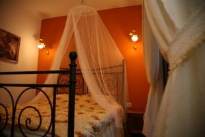 Katil atau katil-katil dalam bilik di Boutique Hotel Colosseo