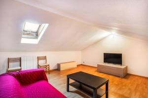 TV a/nebo společenská místnost v ubytování La Chiave D'Oro