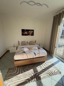 Postel nebo postele na pokoji v ubytování Anisa Home 2