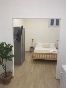 a bedroom with a bed and a tv in it at B&B La Fenice in Chieti