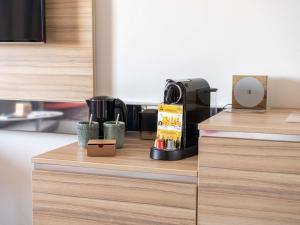 Kuchyň nebo kuchyňský kout v ubytování Novotel Bordeaux Centre Ville + 117 fotografií