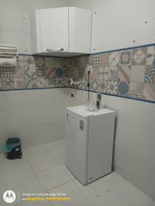 Et badeværelse på Apto bem localizado + 17 billeder