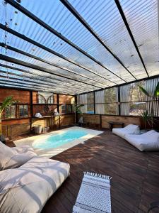 Bazén v ubytování Cabañas en el Bosque a 5 minutos del mar - Estancia CH nebo v jeho okolí + 170 fotografií