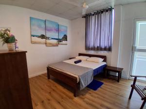 Postel nebo postele na pokoji v ubytování Mbeach Nest