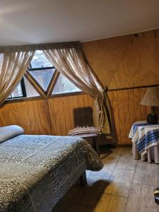 Postel nebo postele na pokoji v ubytování Parcela la Negra