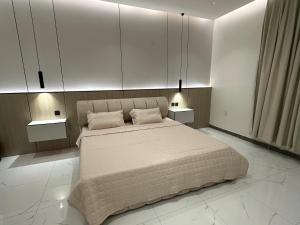 Postel nebo postele na pokoji v ubytování جناح غرفة وصاله