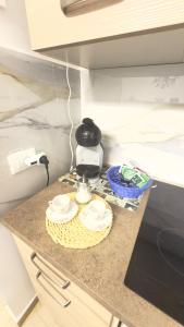 Η κουζίνα ή μικρή κουζίνα στο Perla di Mare