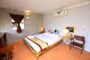 Postel nebo postele na pokoji v ubytování Khu Nghỉ Dưỡng Sinh Thái Charm Eco Retreat