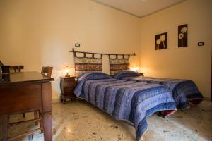 Postel nebo postele na pokoji v ubytování Attiko B&B