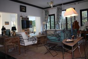 Et tv og/eller underholdning på Villa Familiar con Piscina