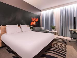 Postel nebo postele na pokoji v ubytování Novotel Milano Linate Aeroporto