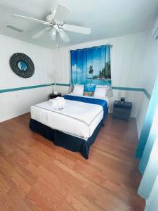 En eller flere senge i et værelse på Playa Esmeralda Cottage