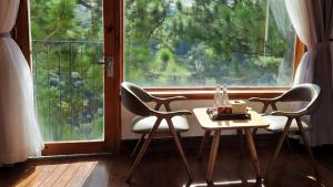 Fotografie z fotogalerie ubytování Hotel Des Pins Dalat v destinaci Xuan An + 64 fotografií