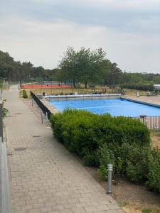 a row of swimming pools in a park at Snäckbacken Visby in Visby