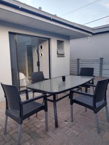 a table and two chairs on a patio at The Gather Inn Bethlehem in Bethlehem +7 photos