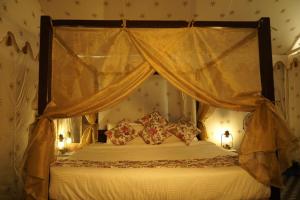 Postel nebo postele na pokoji v ubytování Tiger Echo Resort