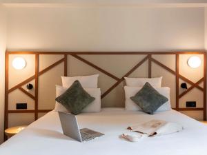 Ένα ή περισσότερα κρεβάτια σε δωμάτιο στο Mercure Rouen Centre Champ de Mars +94 φωτογραφίες