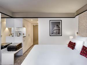 Postel nebo postele na pokoji v ubytování Pullman La Pléiade Montpellier Centre + 145 fotografií