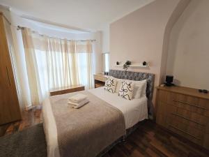 Ένα ή περισσότερα κρεβάτια σε δωμάτιο στο Room 4 Shared House