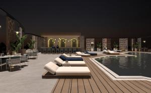 a rendering of a hotel lobby with a pool at voco CAIRO ARABELLA PLAZA by IHG in Cairo