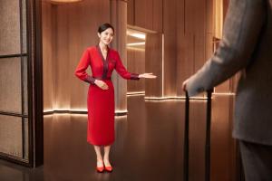 Hosté ubytování HUALUXE Hotels and Resorts Qidong + 3 fotografie