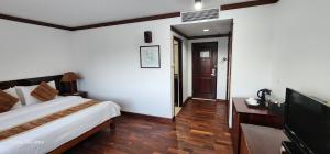 TV a/nebo společenská místnost v ubytování Paradise Angkor Villa