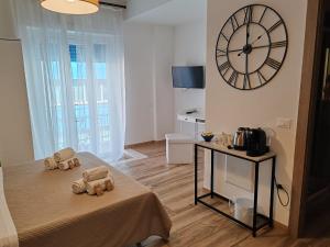 TV a/nebo společenská místnost v ubytování DIMORE IN residenze asproni 24