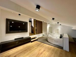 Μια τηλεόραση ή/και κέντρο ψυχαγωγίας στο Green House Hotel