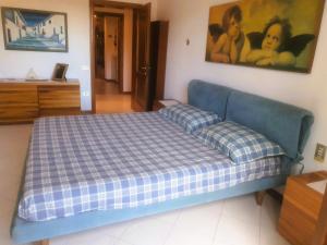 Ένα ή περισσότερα κρεβάτια σε δωμάτιο στο Elegante appartamento in posizione strategica