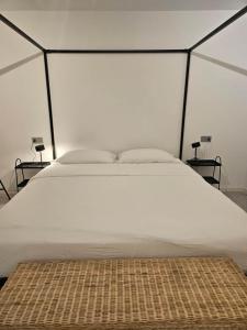 Postel nebo postele na pokoji v ubytování La Cereria