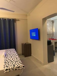 TV a/nebo společenská místnost v ubytování White Loft Diani